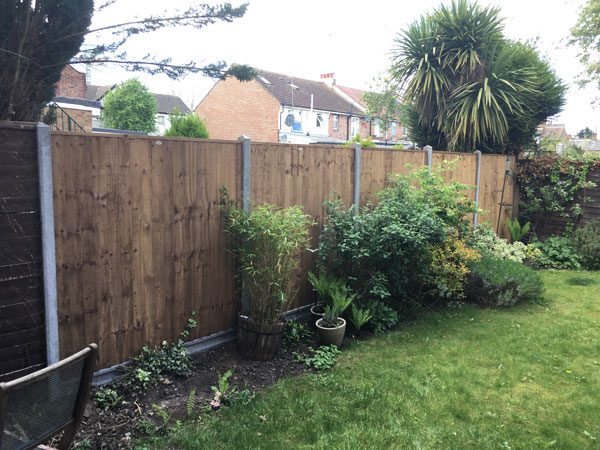 New garden fence with concrete posts and gravel boards in North Finchley