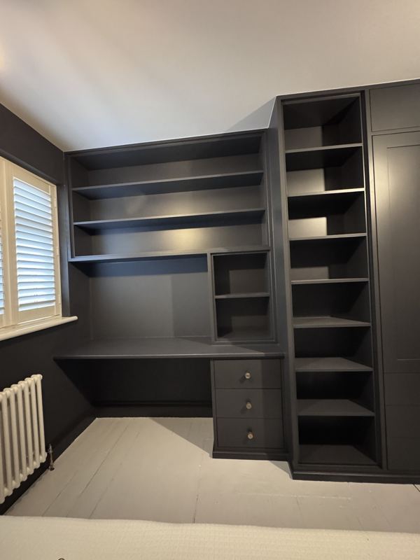 Fitted desk, open shelving tower and wardrobe painted dark grey