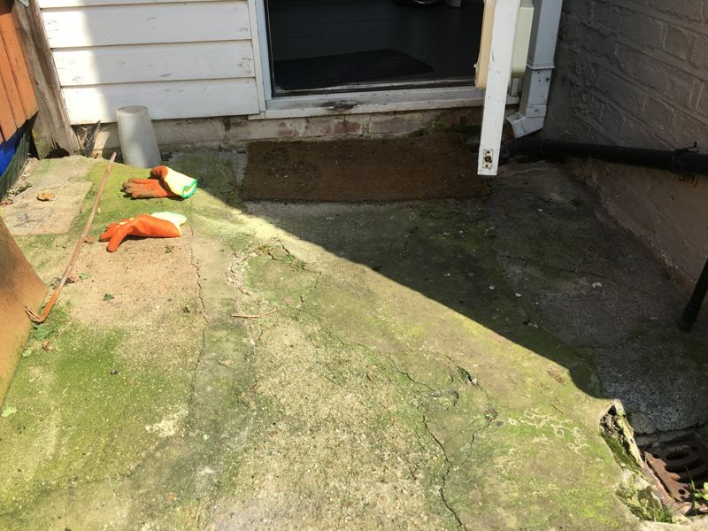 The garden before: cracked concrete