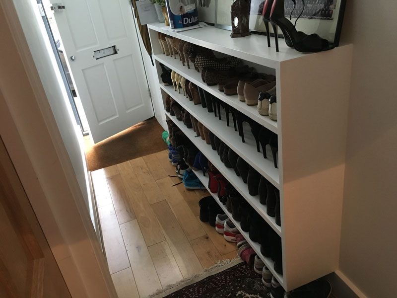 Fitted and painted hallway shoe rack