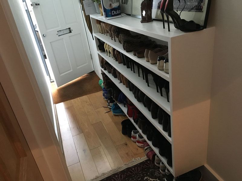 Fitted and painted hallway shoe rack