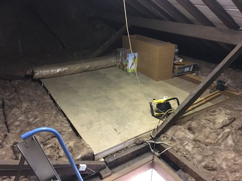 The loft platform with boxes on it