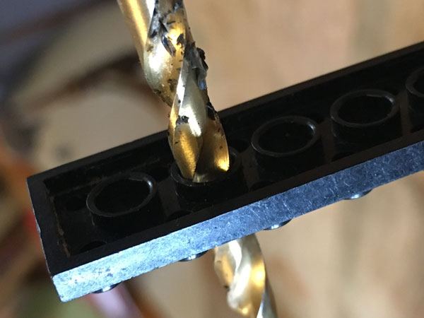 Drilling through a Lego piece